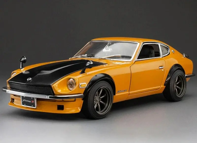 1:18 1970 Nissan Fairlady Z (S30) 1970 -- Orange / Carbon Black -- Sunstar 1