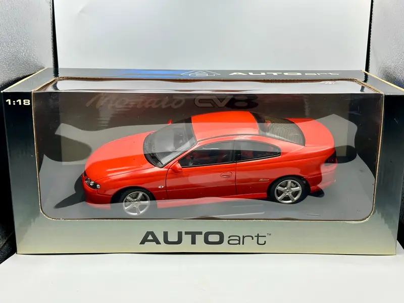 1:18 Holden Monaro V2 Cv8 -- Flame Orange -- Biante/Autoart 1