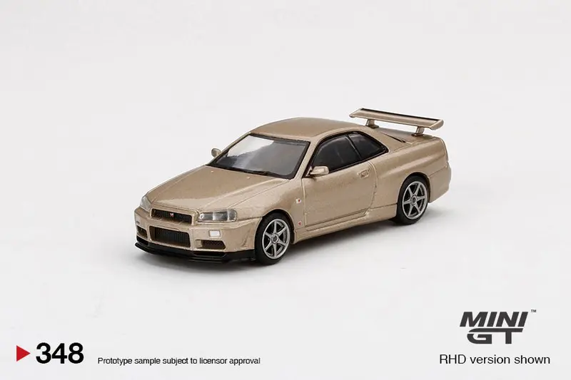 1:64 Nissan Skyline Gt-R (R34) M-Spec -- Silica Breath Gold -- Mini Gt 1