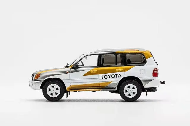 1:64 Toyota Land Cruiser 100 19971 -- Toyota White/Gold/Grey -- Gcd 2