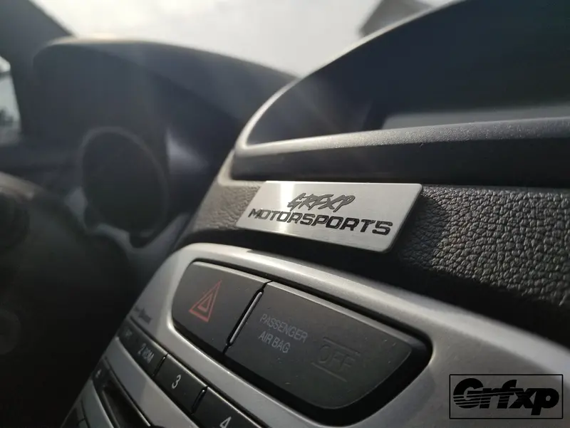 Custom Brushed Steel Console Badges 1